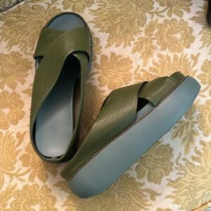 Green slip on sandals